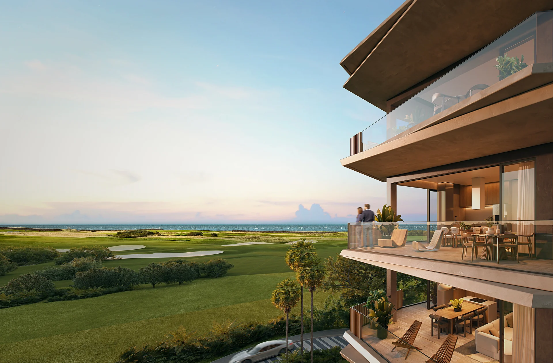 Perspective extérieure au crépuscule sur les terrasses et le fairway de Las Iguanas.