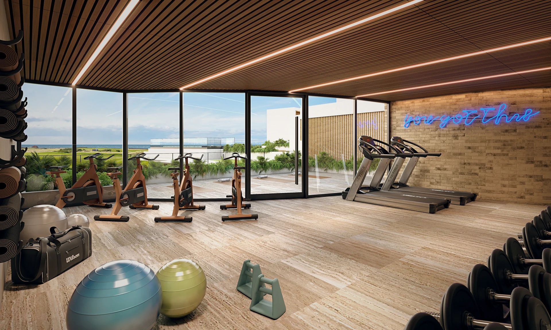 Salle de sport de dernière génération, cardio et musculation en lumière naturelle.
