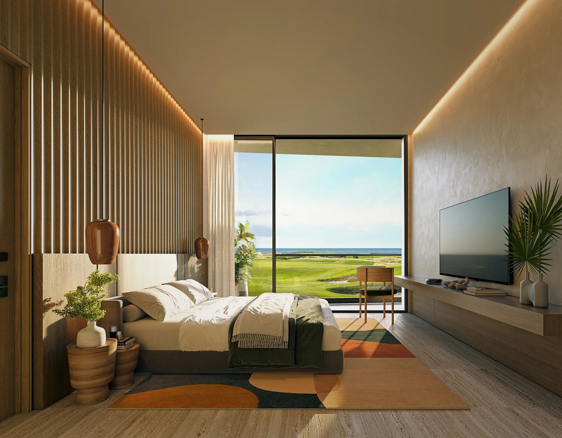 Chambre principale avec accès à la terrasse privée et vues apaisantes sur le golf.