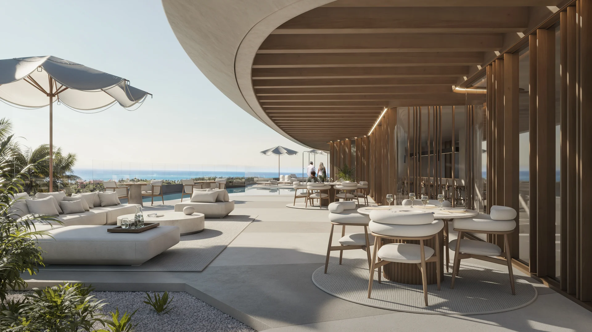 Terrasse panoramique en toiture avec piscine, lounge bar et couchers de soleil sur la marina.