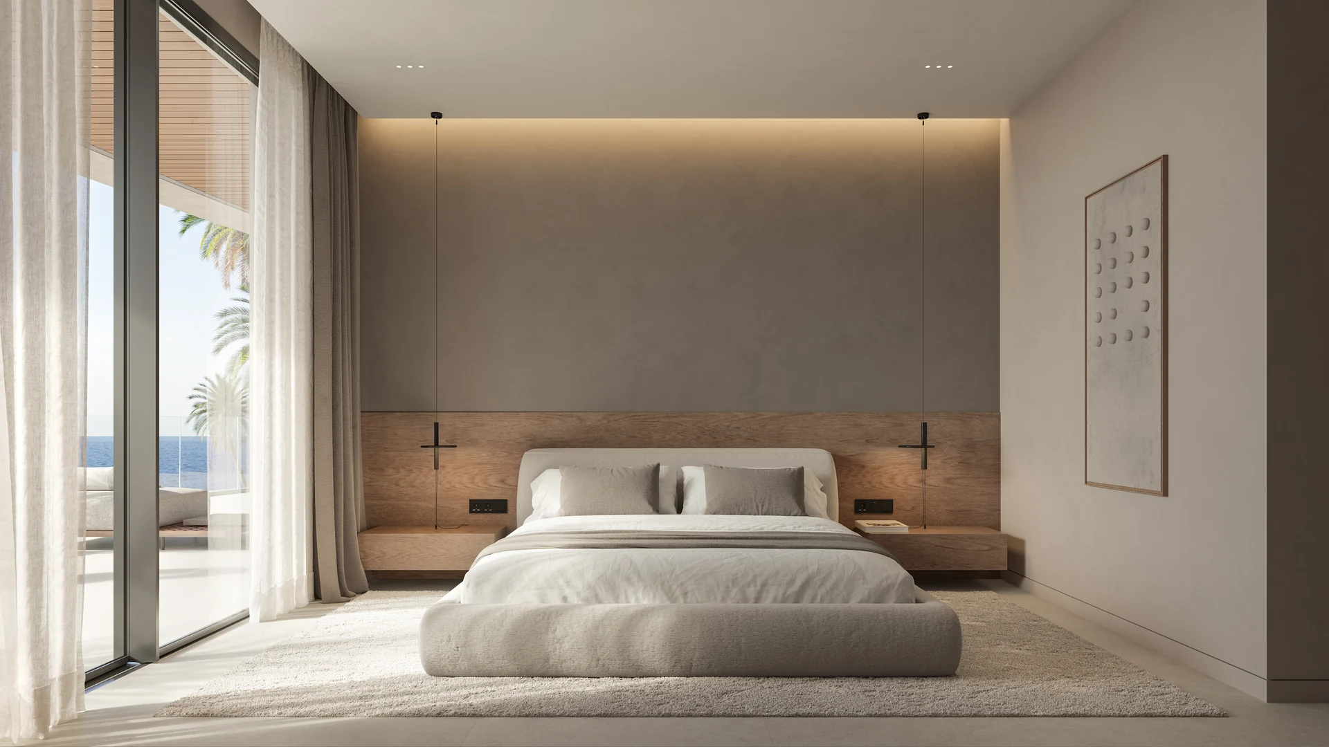 Chambre principale aux larges baies vitrées et accès direct à la terrasse extérieure.
