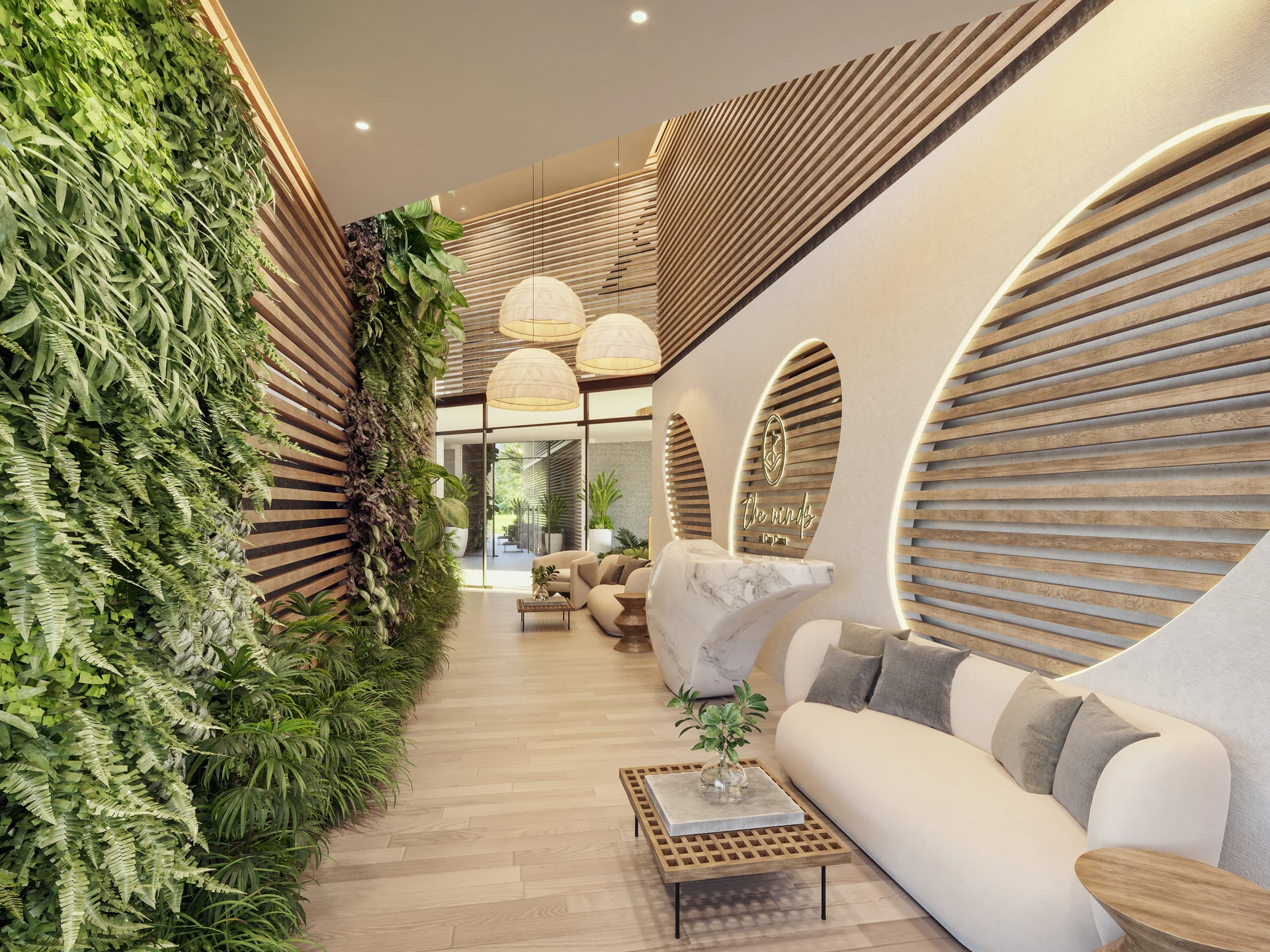Lobby à double hauteur avec atrium central, finitions de bois et conciergerie 24/7.