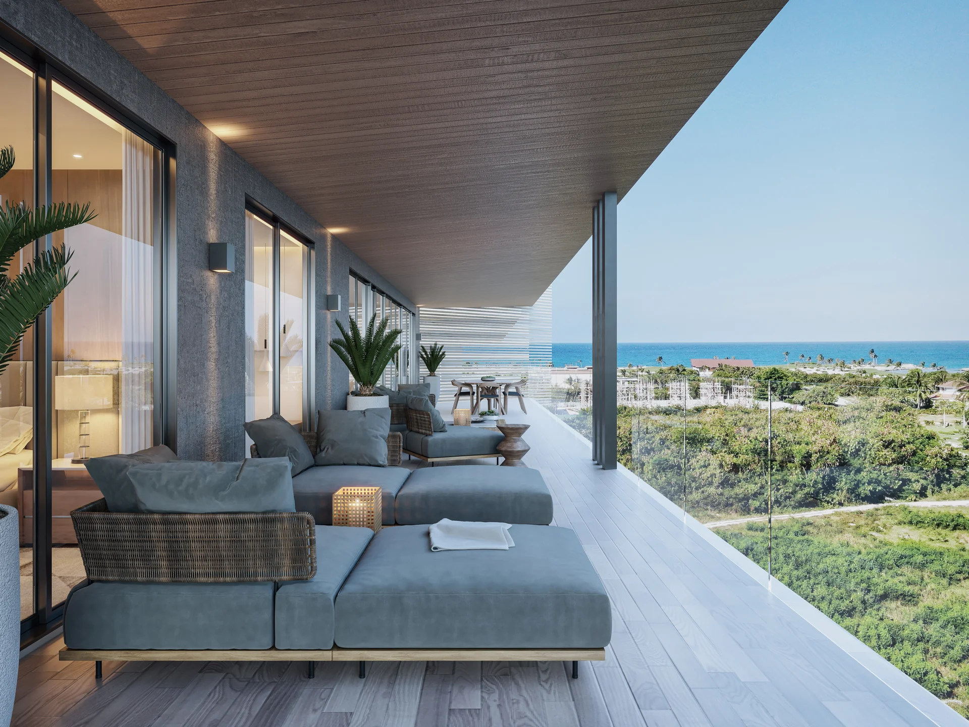 Terrasse solarium au niveau 4 avec jacuzzi privé, transats et vues panoramiques.