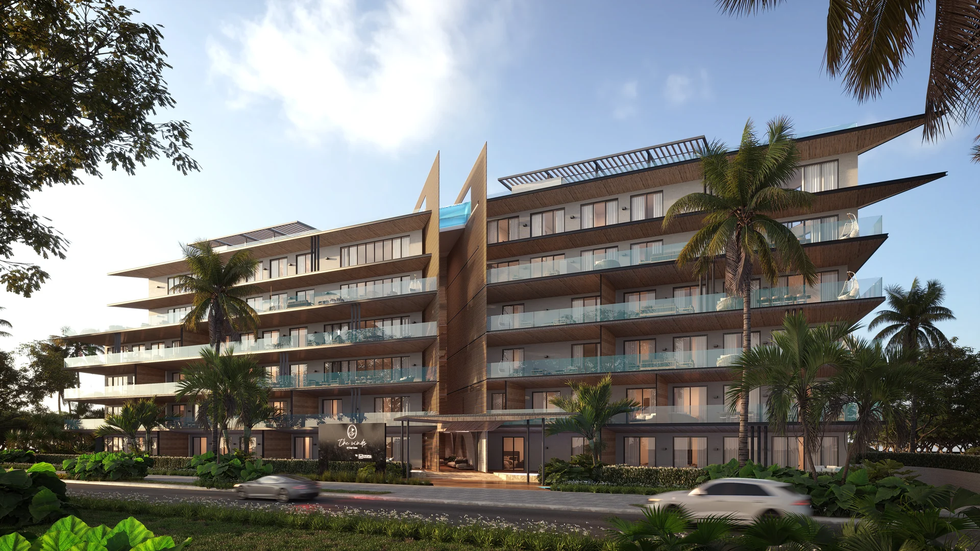 Architecture moderne tropicale aux débords en porte-à-faux, intégrée au paysage de Cap Cana.
